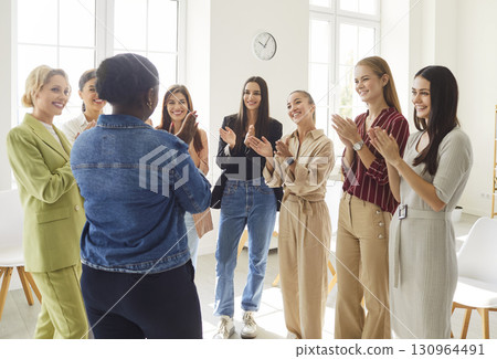 Women Business Team Celebrates Success In Office 130964491