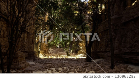 An enchanting pathway winds through ancient stone ruins, illuminated by dappled sunlight. Lush greenery and textured rocks create a serene atmosphere, inviting exploration. 130965282