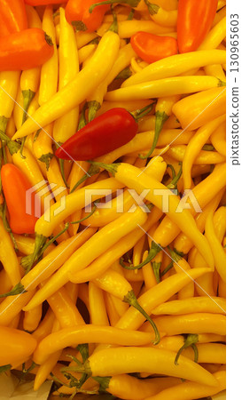 Bright yellow and red peppers, natural vegetables 130965603