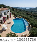 Mediterranean villa with oval pool 130965730