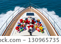 Santa Claus carries presents on a speed yacht. Realistic illustration. 130965735