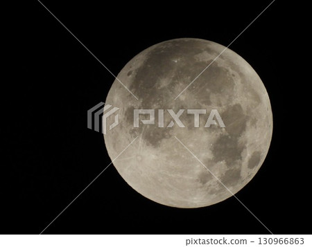 The moon floating in the night sky (full moon 1) before the total lunar eclipse 130966863