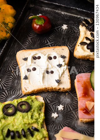 Halloween food for children, monsters toasts 130967434