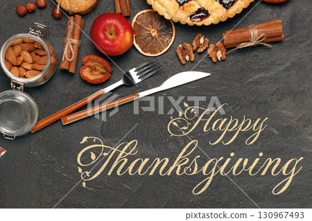 Thanksgiving celebration with festive food on a dark surface Thanksgiving celebration with festive food on a dark surface 130967493