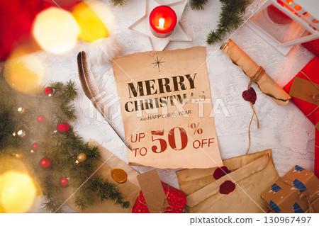 Seasonal sale announcement with festive decorations and promotional offer on Christmas gifts Seasonal sale announcement with festive decorations and promotional offer on Christmas gifts 130967497