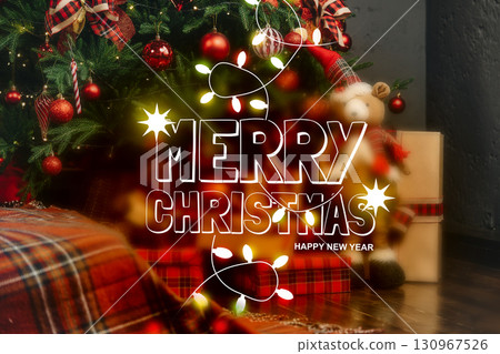 Christmas tree decoration with lights and cozy presents in a festive setting 130967526
