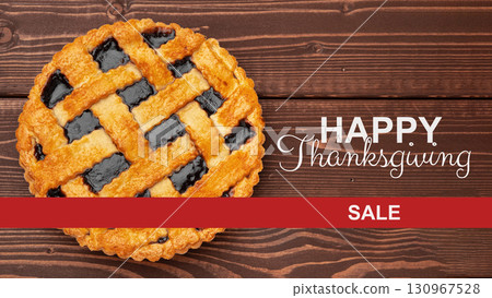 Thanksgiving pie sale celebration with a lattice crust and berry filling on wooden table Thanksgiving pie sale celebration with a lattice crust and berry filling on wooden table 130967528