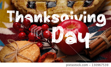 Celebrating Thanksgiving day with festive treats and colorful decorations on the table Celebrating Thanksgiving day with festive treats and colorful decorations on the table 130967539