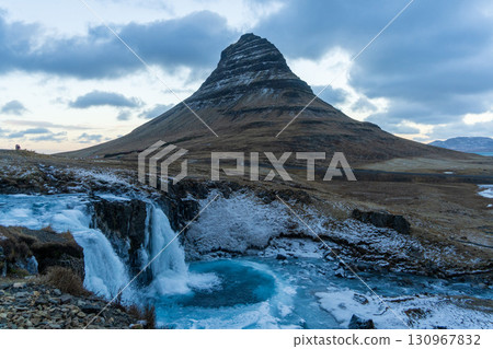 Kirkjufell Mountain and Winter Waterfall (Iceland) 130967832