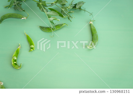Natural green peas and leaves in composition Natural green peas and leaves in composition 130968151
