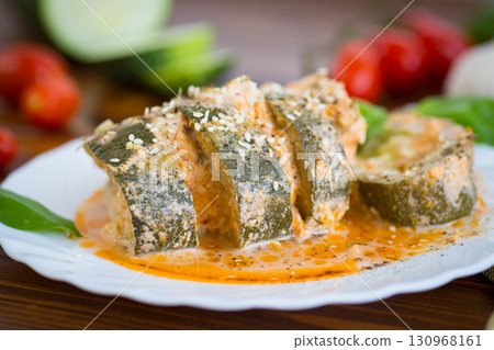 Vegetable dish of zucchini with spicy sauce and spices 130968161
