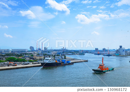 A view of a cargo ship from the Shin Nihonkai Ferry "Azalea" departing from Niigata Port 130968172