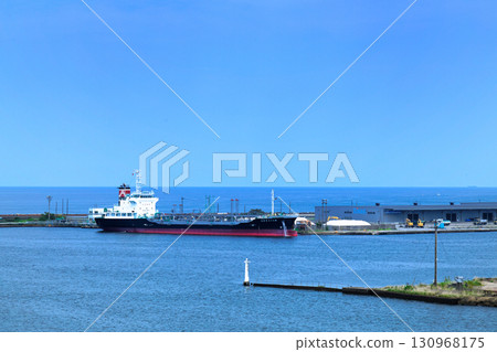 A view of a cargo ship from the Shin Nihonkai Ferry "Azalea" departing from Niigata Port 130968175