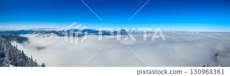 A spectacular view of Mount Asama floating in a sea of clouds and the snow-capped mountains of the Alps (Yamanouchi Town, Nagano Prefecture, Mount Yokote) 130968361
