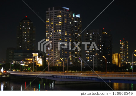Tsukuda Ohashi Bridge and high-rise condominiums over the Sumida River Tsukuda Ohashi Bridge and high-rise condominiums over the Sumida River 130968549