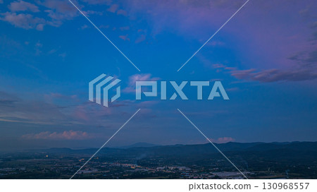 Aerial view of Cloud-Covered Mountain Peak 130968557