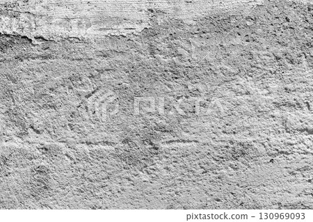 Gray concrete wall texture showing rough and weathered patterns Gray concrete wall texture showing rough and weathered patterns 130969093