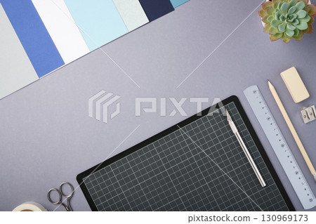 Craft tools on a desk. Creative workspace for art and handmade design preparation. Space for your text. Craft tools on a desk. Creative workspace for art and handmade design preparation. Space for your text. 130969173