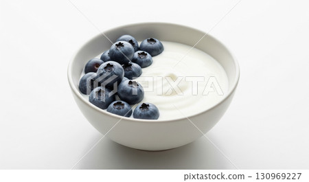 Fresh Blueberries with Yogurt in White Ceramic Bowl 130969227