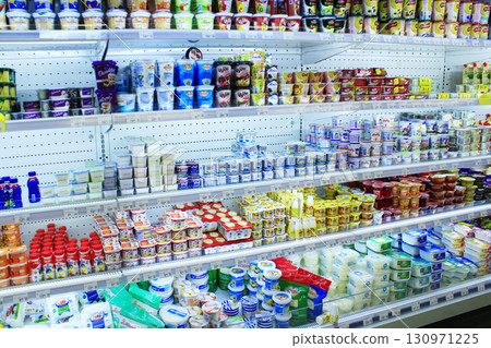 Shop of dairy products. Wide choice of milky goods Shop of dairy products. Wide choice of milky goods 130971225