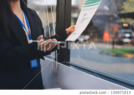 Success, audience with an applause and in a business meeting at work with a lens flare together. Achievement or celebration, motivation and businesspeople clapping hands for good news or support 130971813