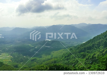 View of the beautiful jungle depths of Yanoda Park on Hainan Island, China. 130972610