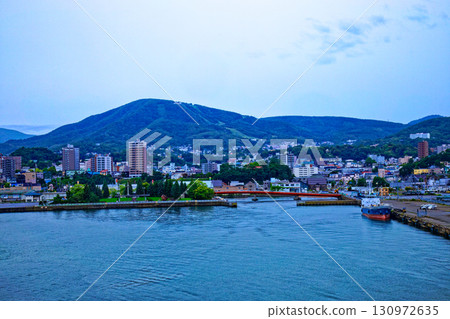 View of the cityscape in the direction of Tenguyama from the New Japan Sea Ferry "Azalea" departing from Otaru Port 130972635