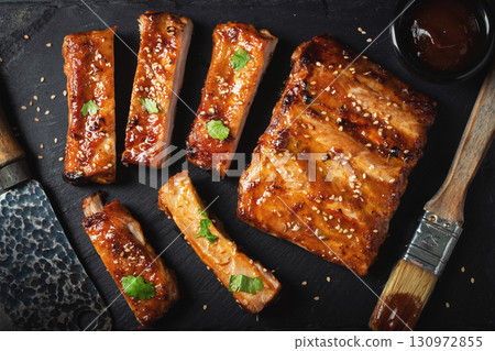 Barbecue pork spare ribs with hot honey chili marinade on black background 130972855