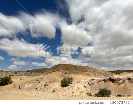 Kholot Tsivoniyim - mountains and dunes of multi-colored sand Kholot Tsivoniyim - mountains and dunes of multi-colored sand 130973731