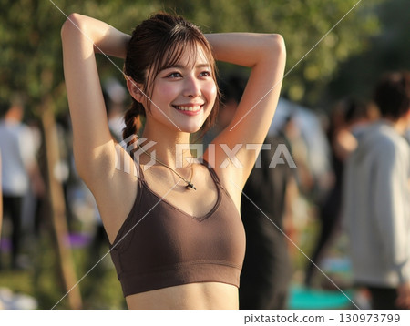 A woman with a bright smile and fresh sportswear 130973799