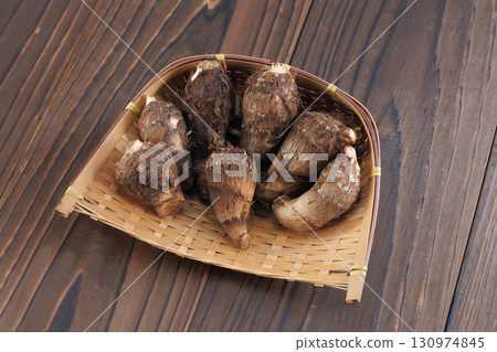 Fresh taro in a colander 130974845