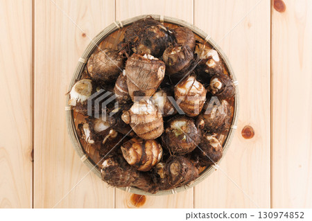 Fresh taro in a colander 130974852