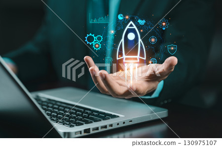 Startup business concept: a rocket is launching into space, just like for growing businesses and fast business success. digital marketing, idea generation, startup founder, network connection. 130975107