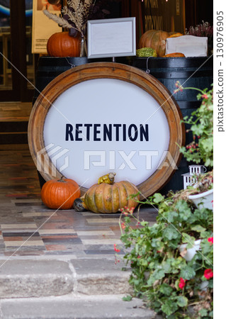 Business and Marketing concept. Copy space written on Vibrant autumn display with colorful pumpkins and rustic decor Business and Marketing concept. Copy space written on Vibrant autumn display with colorful pumpkins and rustic decor 130976905