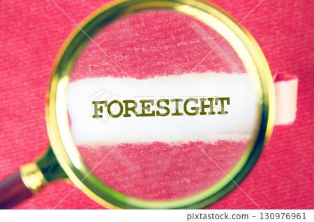 FORESIGHT word was found using a magnifying glass under a piece of paper. Business, Technology, Internet and network concept. FORESIGHT word was found using a magnifying glass under a piece of paper. Business, Technology, Internet and network concept. 130976961