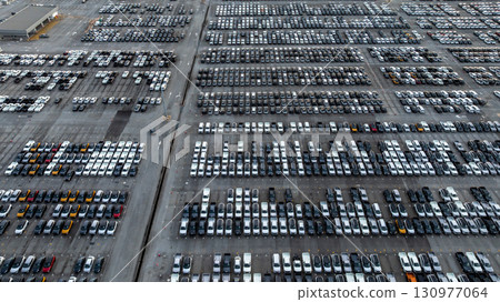 Aerial view car for sale stock lot row, Cars dealership inventory distribution automobile and automotive business, New cars parking for sale automobile automotive industry business. Aerial view car for sale stock lot row, Cars dealership inventory distribution automobile and automotive business, New cars parking for sale automobile automotive industry business. 130977064