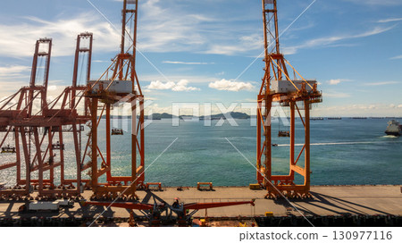 Aerial view container cargo ship international port terminal with gantry crane, Global business import export logistic maritime transport by container cargo ship vessel, Container ship cargo freight. 130977116