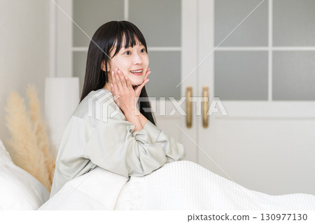 A Japanese woman with beautiful skin who can sleep well and has good sleep quality and good skin condition A Japanese woman with beautiful skin who can sleep well and has good sleep quality and good skin condition 130977130