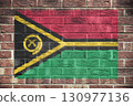 Vanuatu flag on a brick wall background 130977136