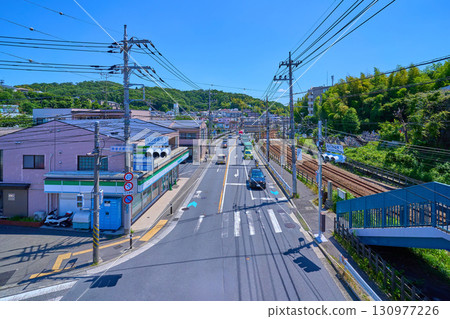 View of the area towards Yomiuri Land-mae Station from the intersection under Takaishi pedestrian bridge on the border between Asao Ward and Tama Ward in Kawasaki City, Kanagawa Prefecture 130977226