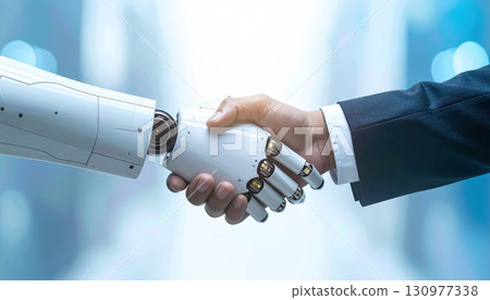 AI image: Close-up of a human and a robot shaking hands 130977338