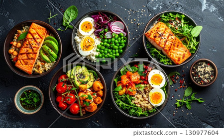 A colorful, healthy vegetarian dish of fresh vegetables on a wooden plate A colorful, healthy vegetarian dish of fresh vegetables on a wooden plate 130977604