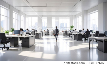 The contemporary airport waiting room has empty business chairs and a conference table near a large window 130977607