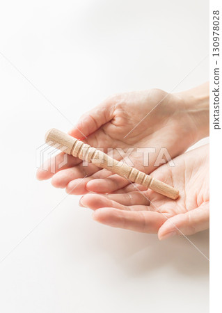 Acupressure stick on the palm Acupressure stick on the palm 130978028