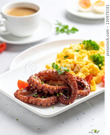 Stir-Fried Octopus Tentacles with Creamy Omelette Stir-Fried Octopus Tentacles with Creamy Omelette 130978181