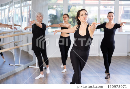 Group of women rehearsing ballet dance Group of women rehearsing ballet dance 130978971