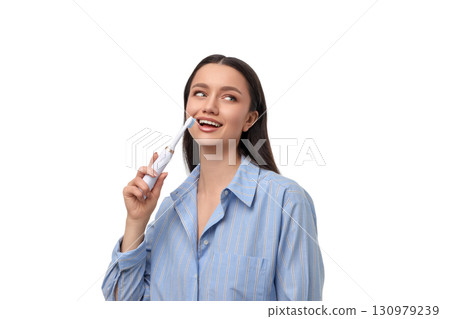 Smiling woman cleans teeth with toothbrush, isolated, PNG Smiling woman cleans teeth with toothbrush, isolated, PNG 130979239