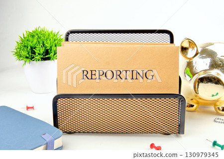 Concept word REPORTING. Checklist business performance monitoring concept 130979345