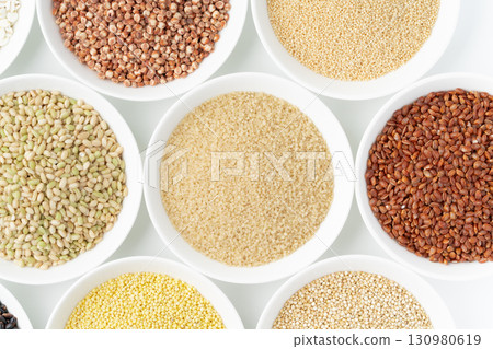 Various types of grains arranged on a plate Various types of grains arranged on a plate 130980619