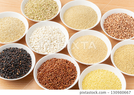 Various types of grains arranged on a plate Various types of grains arranged on a plate 130980667